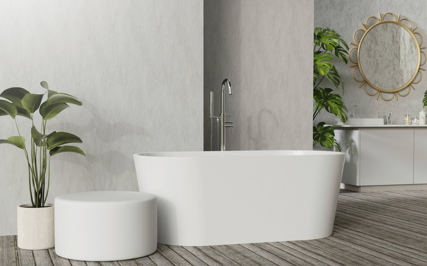 Ein modernes Badezimmer mit einer minimalistischen, freistehenden Badewanne, einem schicken, runden Hocker und einem dekorativen, runden Spiegel perfekt für eine stilvolle Inneneinrichtung Ein modernes Badezimmer mit einer minimalistischen, freistehenden Badewanne, einem schicken, runden Hocker und einem dekorativen, runden Spiegel perfekt für eine stilvolle Inneneinrichtung