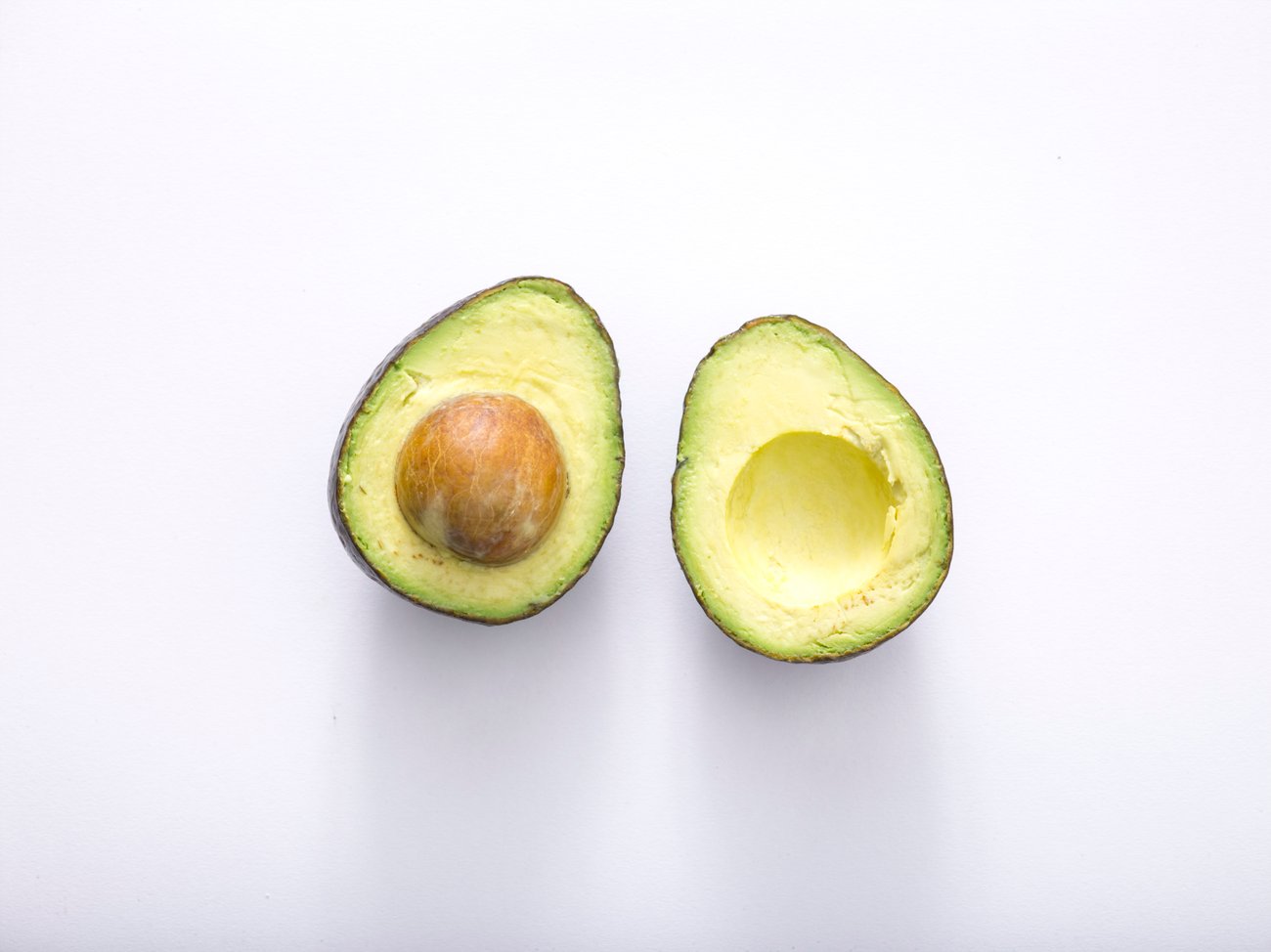 Kalorien in Avocados: Aufgeschnittene Avocado Kalorien in Avocados: Aufgeschnittene Avocado