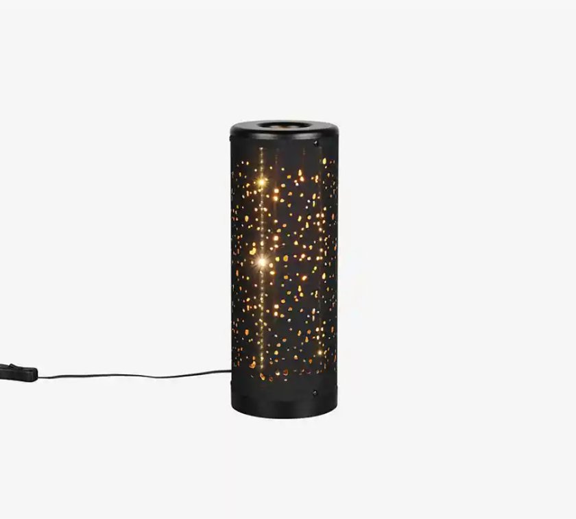 Eine Tischleuchte mit Sterneneffekt. Eine Tischleuchte mit Sterneneffekt.