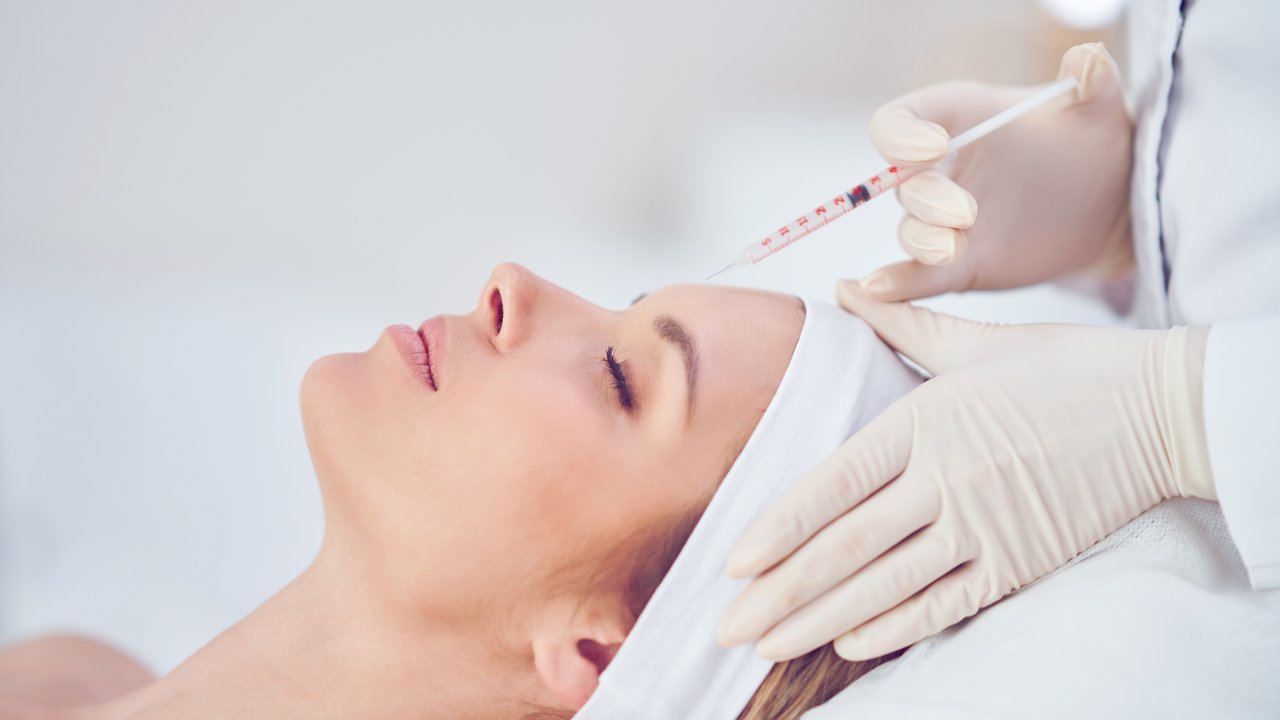 A scene of medical cosmetology treatments botox injection. High quality photo