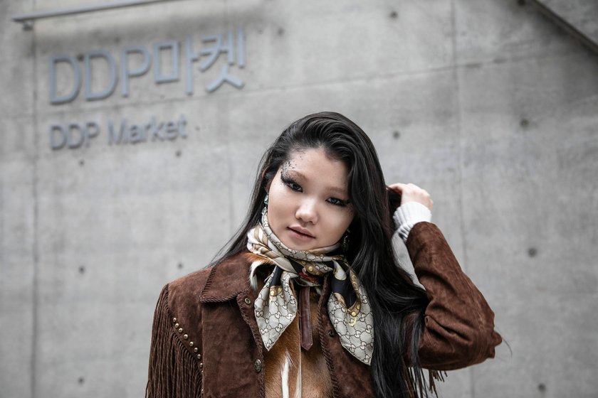 SEOUL, SOUTH KOREA - MARCH 15: A guest wears a Gucci scarf and a vintage suede cowboy jacket at Seoul Fashion Week AW 23 on March 15, 2023 in Seoul, South Korea. (Photo by Jean Chung/Getty Images) SEOUL, SOUTH KOREA - MARCH 15: A guest wears a Gucci scarf and a vintage suede cowboy jacket at Seoul Fashion Week AW 23 on March 15, 2023 in Seoul, South Korea. (Photo by Jean Chung/Getty Images)