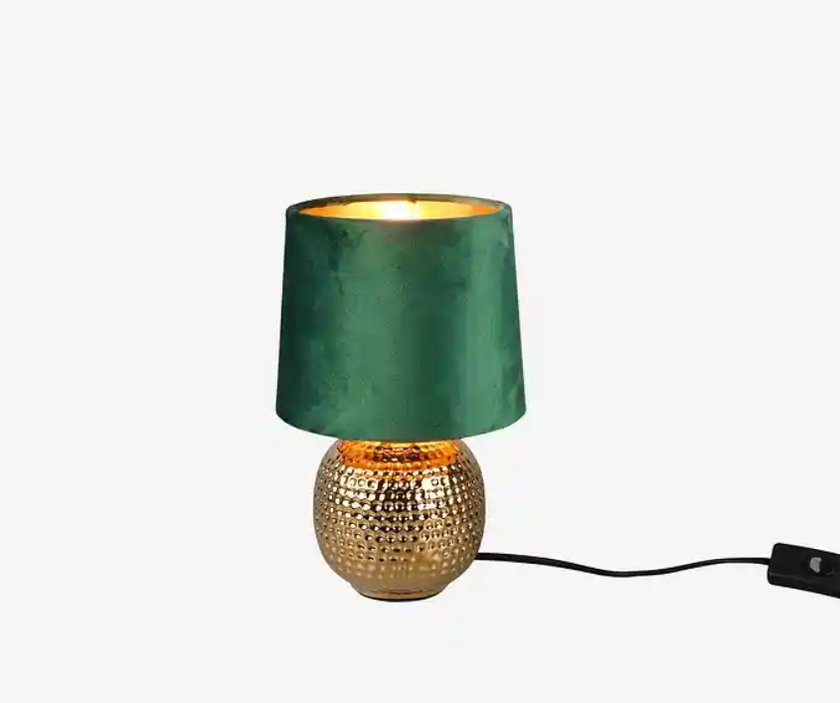 Eine Lampe mit grünem Lampenschirm. Eine Lampe mit grünem Lampenschirm.