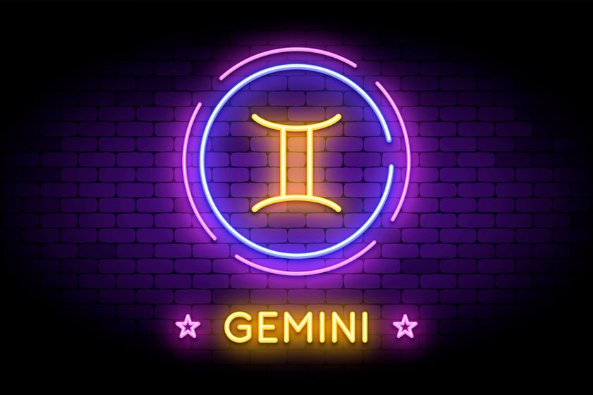 The Gemini zodiac symbol, horoscope sign in trendy neon style on a wall. Gemini astrology sign with light effects for web or print.