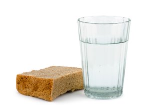 Bread and water, isolated on white background Bread and water, isolated on white background