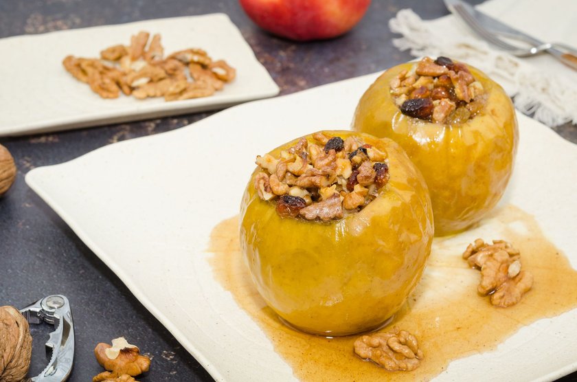 Baked apples dessert with raisins and nuts