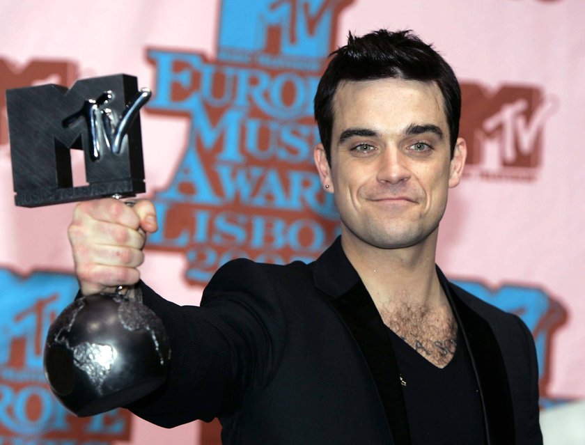 LISSABON 20051103 Robbie Williams vann kategorin Best Male Act pa MTV Europe Music Awards 2005 i Lissabon torsdagen den 3 november 2005. Foto Anders Wiklund / SCANPIX Code 50030 x50030x *** LISSABON 20051103 Robbie Williams won the Best Male Act category at the MTV Europe Music Awards 2005 in Lisbon on Thursday, November 3, 2005 Photo Anders Wiklund SCANPIX Code 50030 x50030x PUBLICATIONxNOTxINxDENxNORxSWExFIN Copyright: xAndersxWiklundx/xTTx 50030