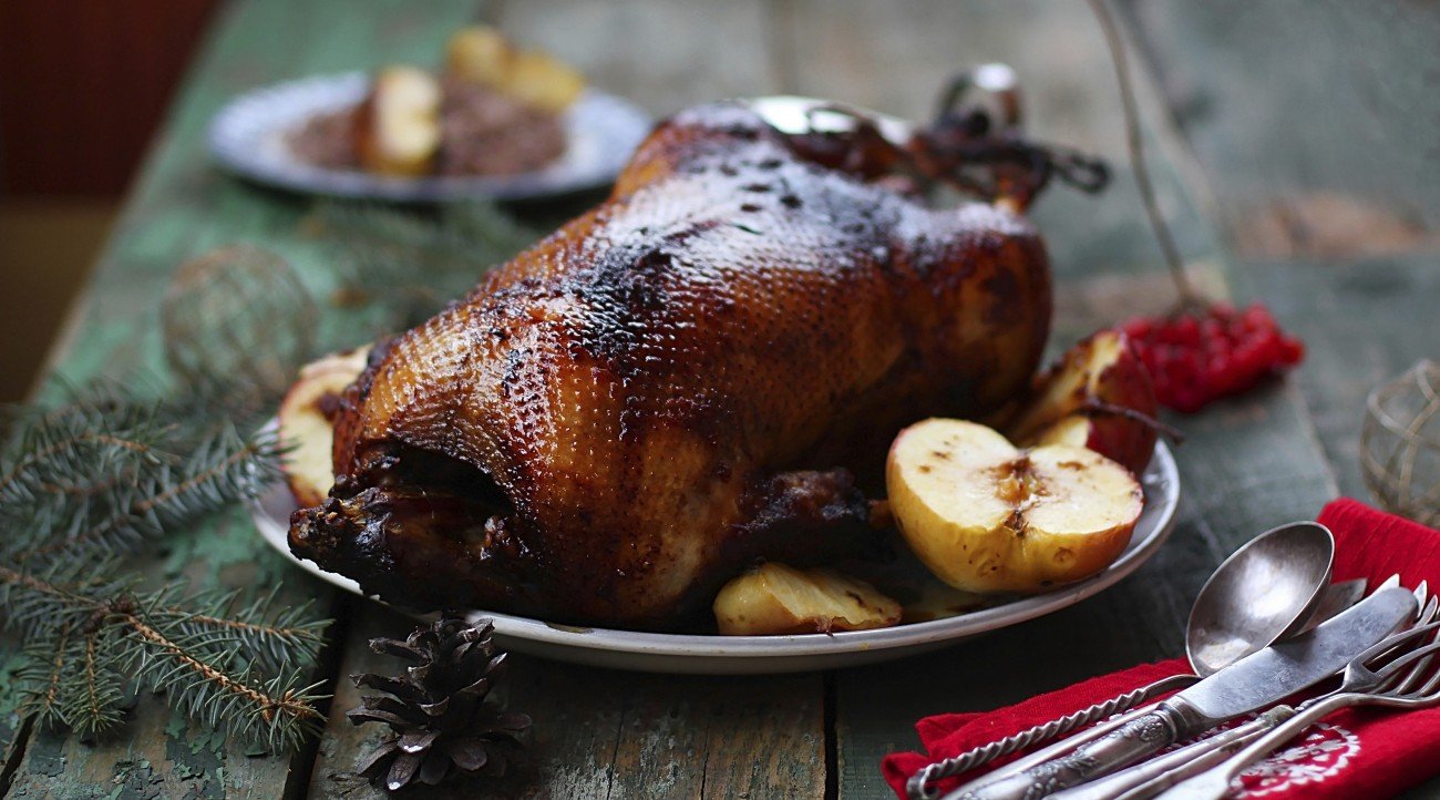 the Christmas baked goose with apples. vintage style.