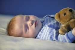 Baby, 8 Monate, schläft. Baby, 8 Monate, schläft.