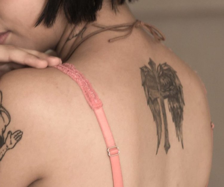 Rücken frauen tattoo motive Lotus Tattoos