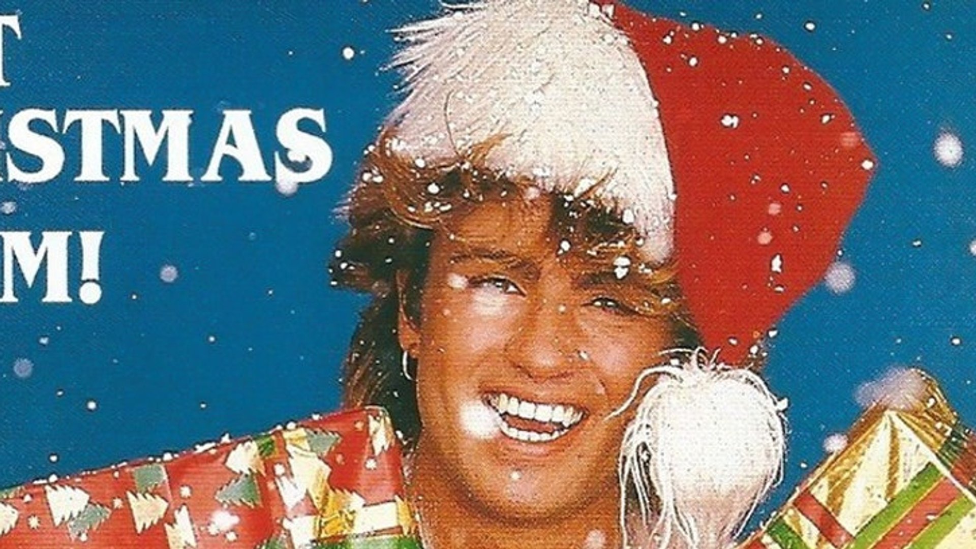 Ласт кристмас джордж. Wham last Christmas. Last Christmas клип. Xmas певец. George Michael last Christmas.