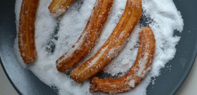 Churros sind eine spanische Spezialität Churros sind eine spanische Spezialität