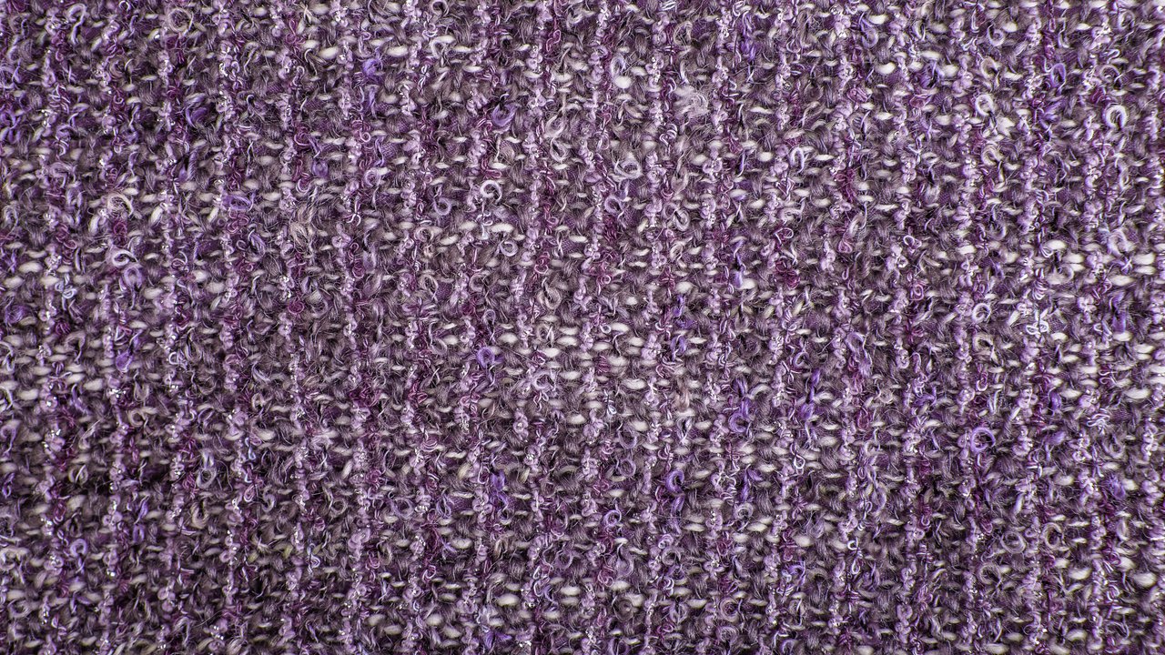 Texture background of melange boucle fabric with lurex thread