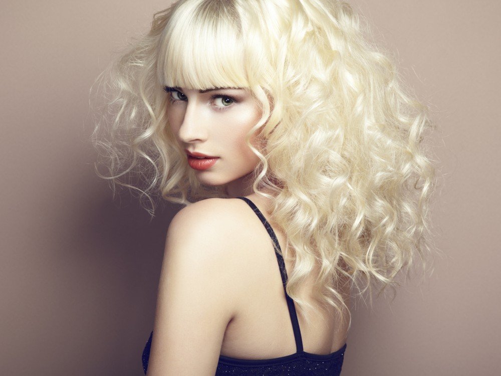 Portrait of beautiful young blonde girl. Fashion photo Portrait of beautiful young blonde girl. Fashion photo