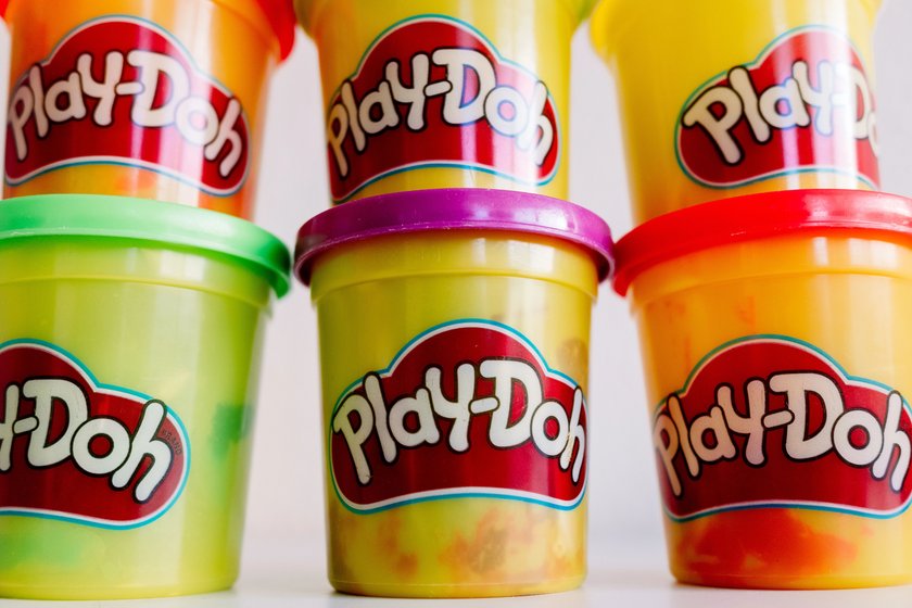 Valencia, Knetespain - february 9, 2022: Play-doh brand plasticine cans.