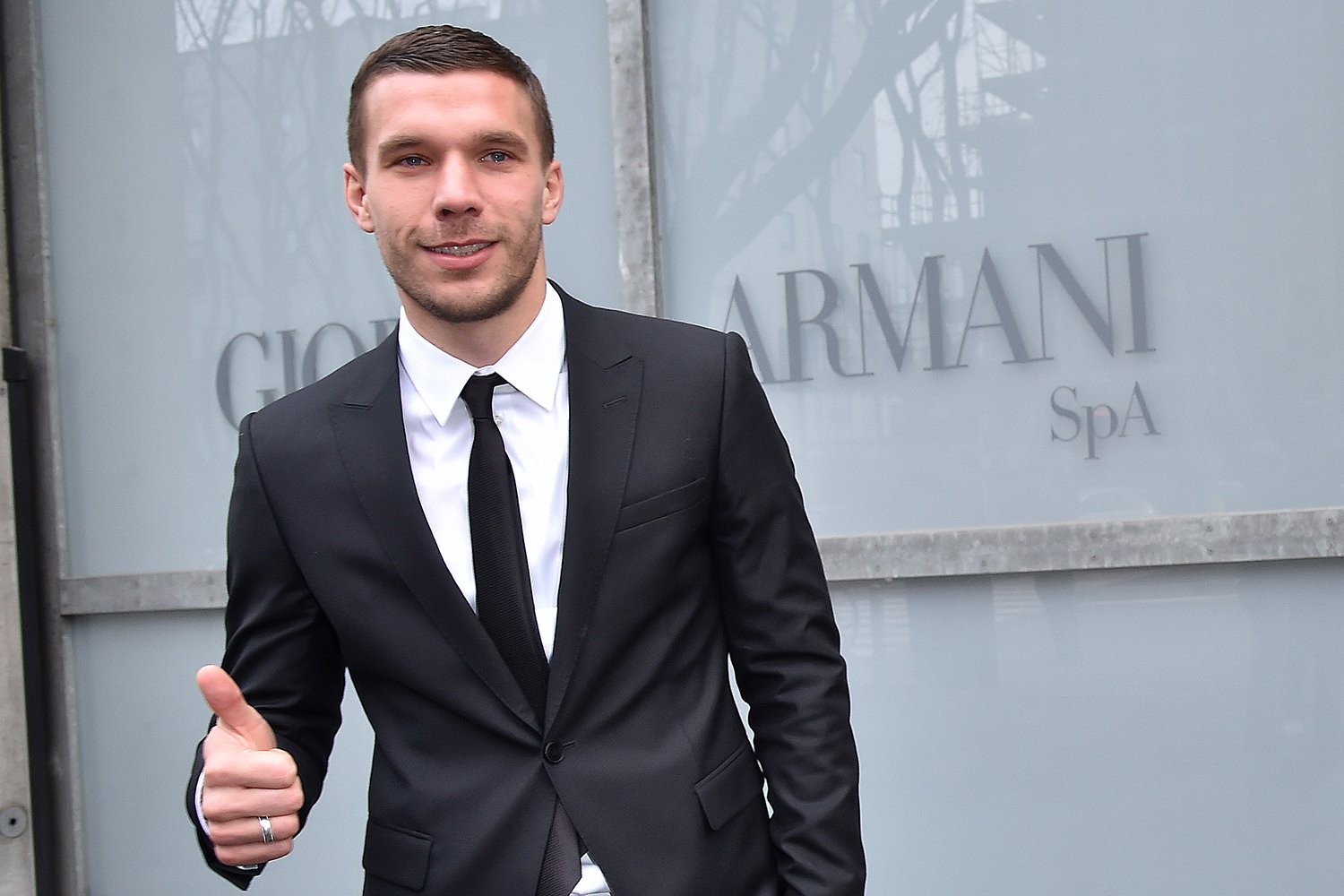 Lukas Podolski zeigt neue Tattoos desired.de