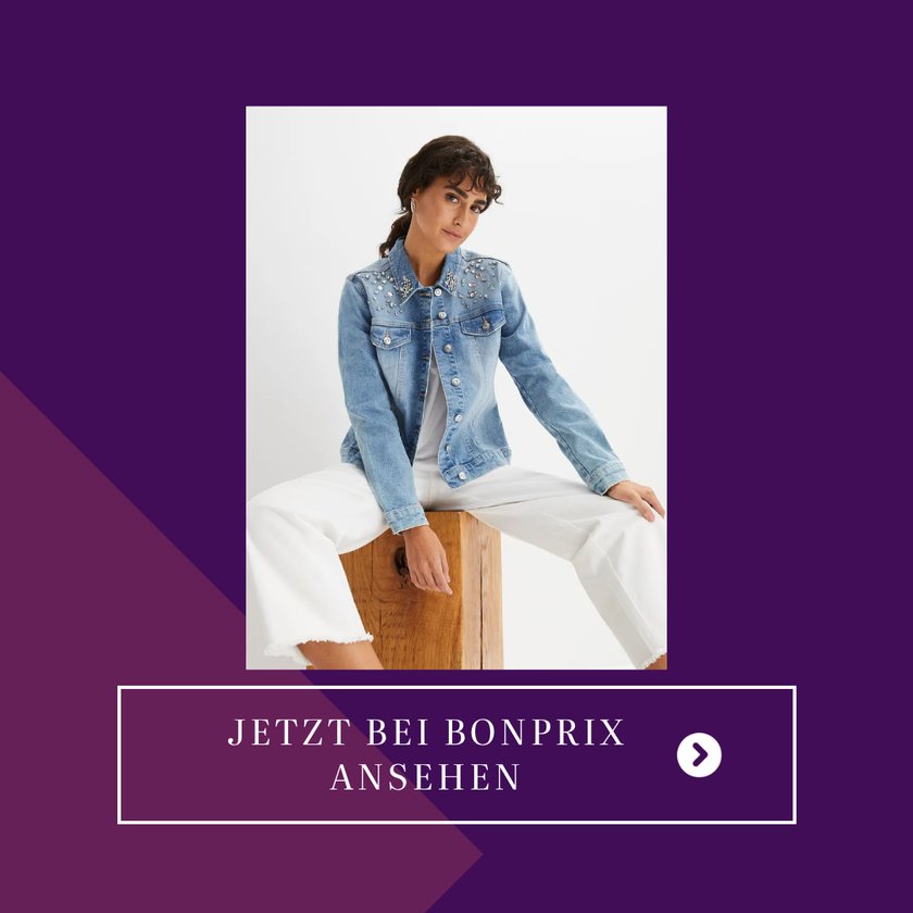 Eine&#x20;Frau&#x20;tr&#x00E4;gt&#x20;eine&#x20;elegante&#x20;Jeansjacke&#x20;mit&#x20;Strass