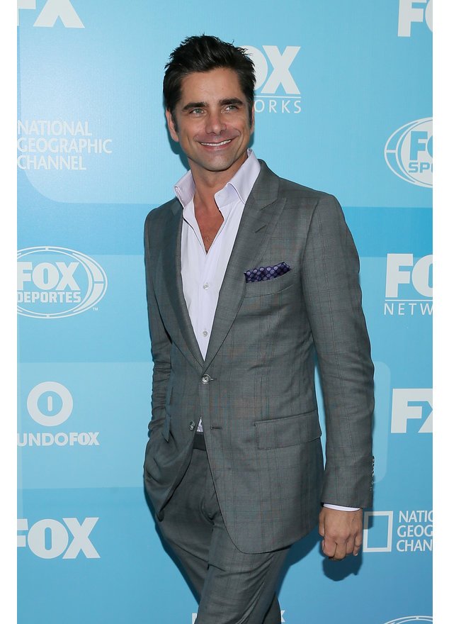 John Stamos lacht für die Kameras John Stamos lacht für die Kameras