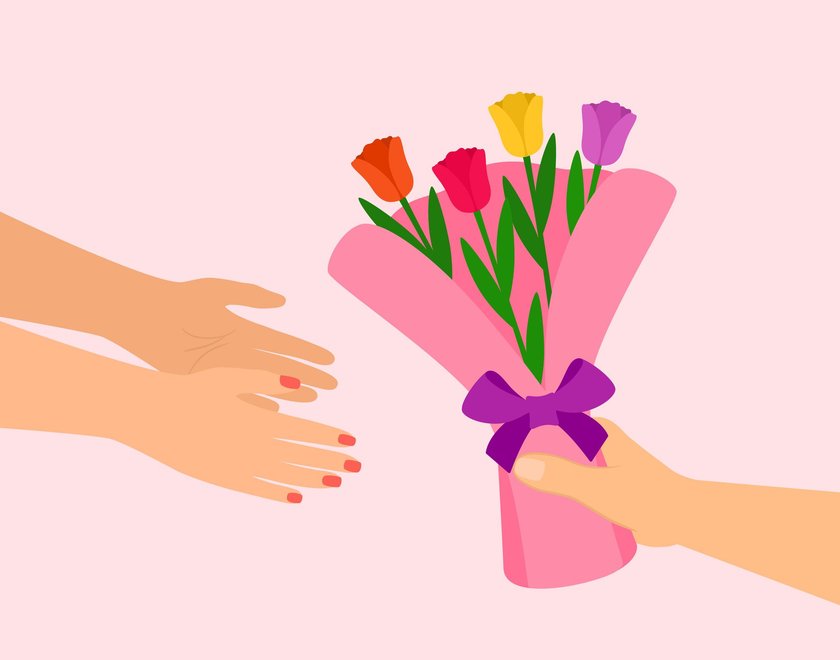 Male Hand Giving Bouquet Of Tulips To Female Hand. Celebrating Valentine's Day, Mother's Day, Women's Day Or Birthday