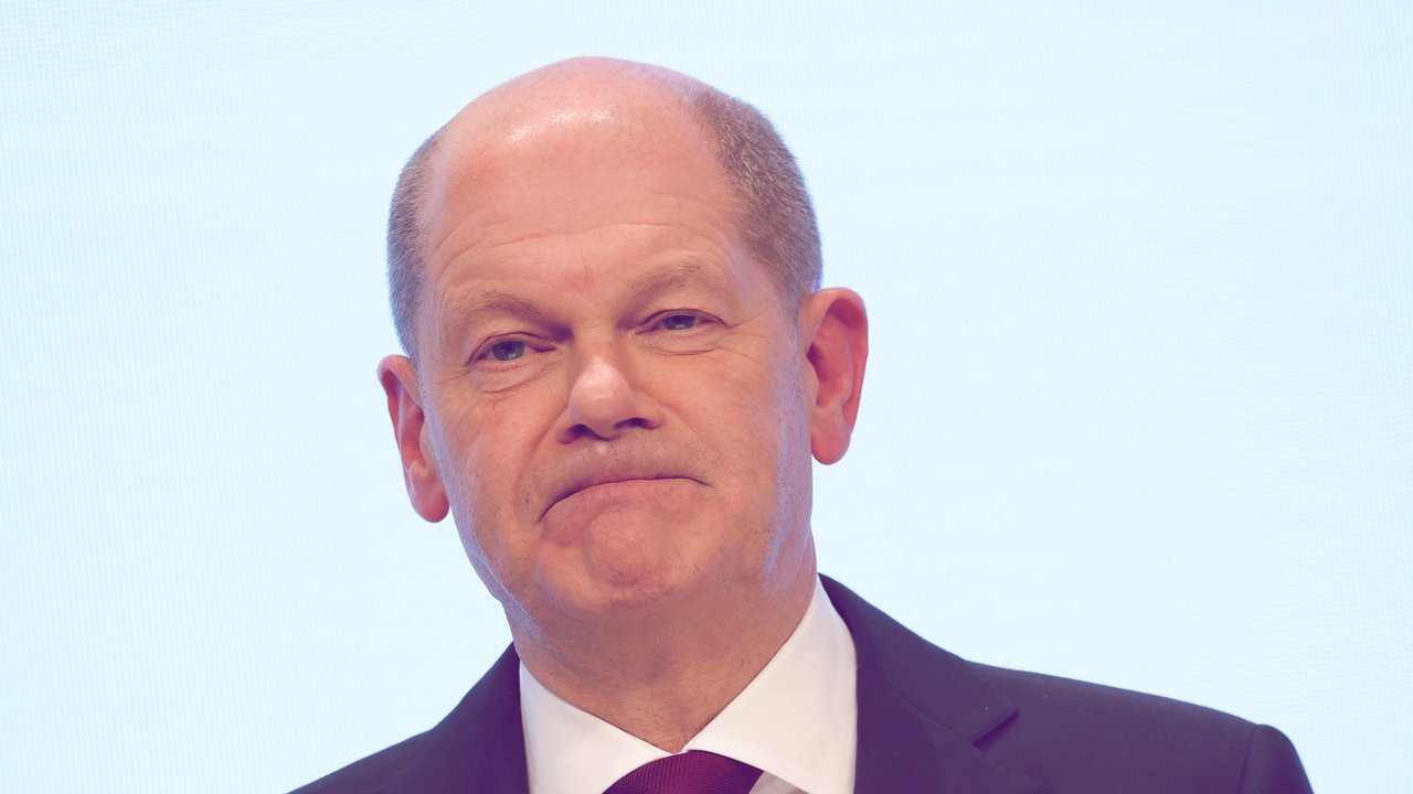 BERLIN, GERMANY - NOVEMBER 24: Olaf Scholz of the German Social Democrats (SPD), who will very likely become the next German chancellor, speaks to the media while he and leaders of the German Free Democrats (FDP) and the Greens Party presented their mutually-agreed on coalition contract on November 24, 2021 in Berlin, Germany. The contract establishes the policy framework for the three parties to create the next federal coalition government. The three parties have been in coalition negotiations over the weeks following federal parliamentary elections last September.  (Photo by Sean Gallup/Getty Images)