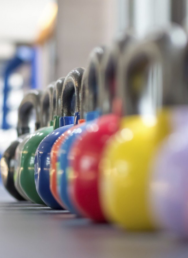 colorful kettlebell lining on table