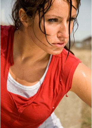 Schwitzende sportliche Frau Schwitzende sportliche Frau
