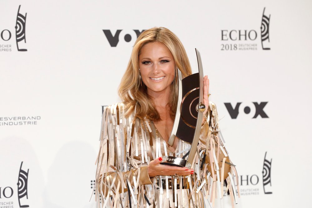 BERLIN GERMANY APRIL 12 Helene Fischer poses with her award during the Echo