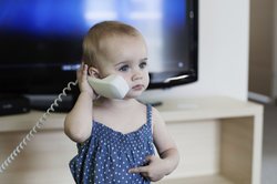 Baby, 9 Monate, kommuniziert. Baby, 9 Monate, kommuniziert.