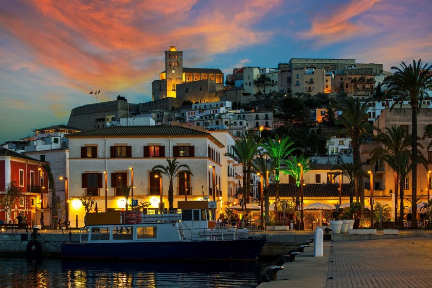 View from promenade of the old town, houses and cathedral under beautiful evening sky in Eivissa, Ibiza, Spain.