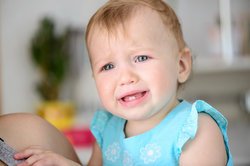 Baby, 9 Monate, weint. Baby, 9 Monate, weint.