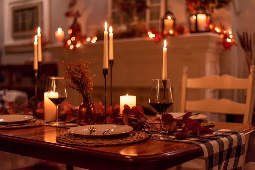 Cozy candlelight holiday dinner table