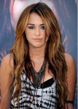 Miley Cyrus schreibt fleißig Autogramm Miley Cyrus schreibt fleißig Autogramm