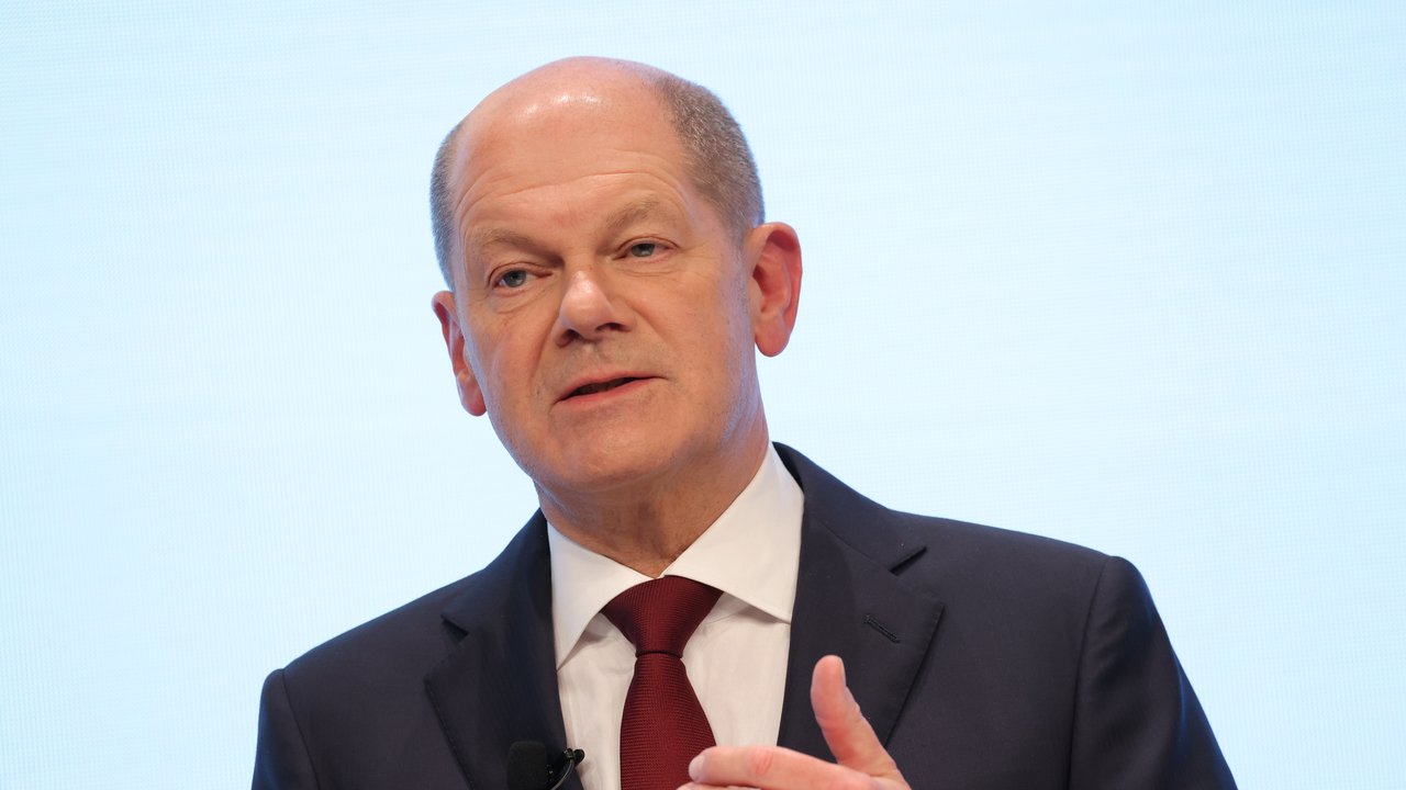 BERLIN, GERMANY - NOVEMBER 24: Olaf Scholz of the German Social Democrats (SPD), who will very likely become the next German chancellor, speaks to the media while he and leaders of the German Free Democrats (FDP) and the Greens Party presented their mutually-agreed on coalition contract on November 24, 2021 in Berlin, Germany. The contract establishes the policy framework for the three parties to create the next federal coalition government. The three parties have been in coalition negotiations over the weeks following federal parliamentary elections last September.  (Photo by Sean Gallup/Getty Images)